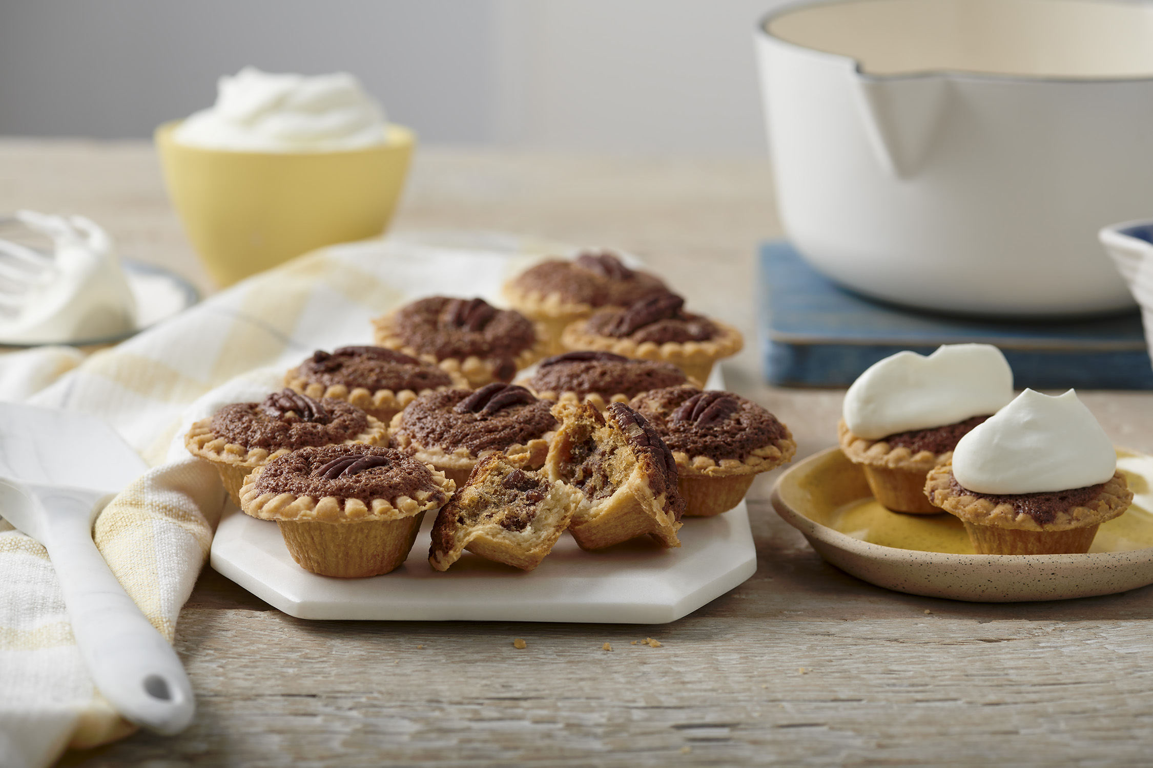 Butterscotch pecan tarts with whip cream